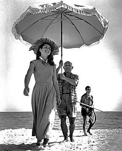 Pintura abstrata a óleo de Pablo Picasso, mostrando fragmentos de figuras humanas e objetos em tons de azul e laranja desbotados.