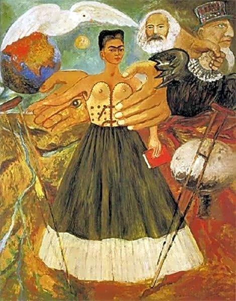 Autorretrato de Frida Kahlo com expressão intensa e olhar direto, vestida com trajes tradicionais mexicanos em tons de azul e verde.